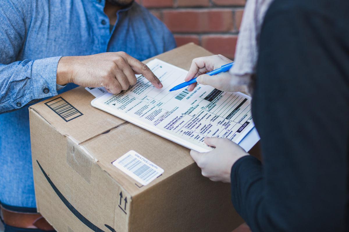 Signing shipping forms for a courier parcel